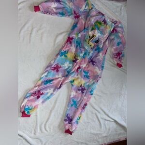 Unicorn onesie with hood and zipper buttflap.